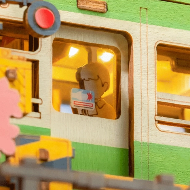 3D Holzpuzzle Japanische Straßenbahn mit Kirschblüten