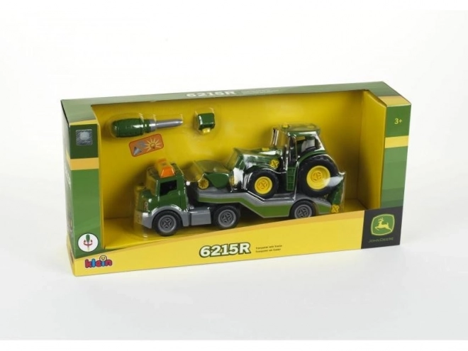Traktor John Deere auf Anhänger zum Zusammenbauen