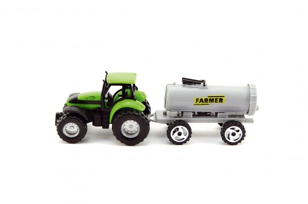 Grüner Traktor mit grauem Anhänger