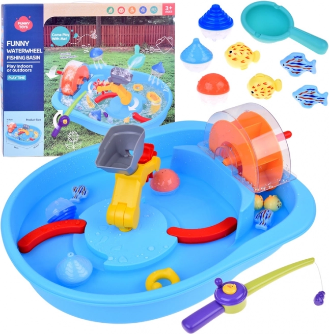 Blauer Wassertisch mit Mühlrad und Angelzubehör