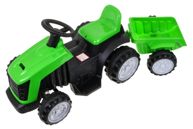 Grüner Traktor mit Anhänger – grün