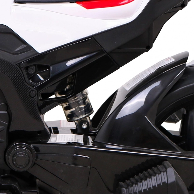 Kinder-Elektromotorrad BMW HP4 Rot + Stützräder + sanfter Start + EVA + MP3 LED