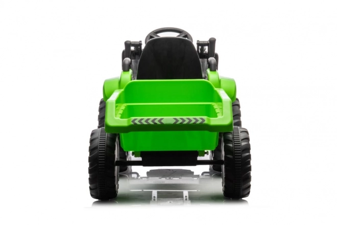 Elektrischer Kindertraktor mit funktionaler grüner Schaufel