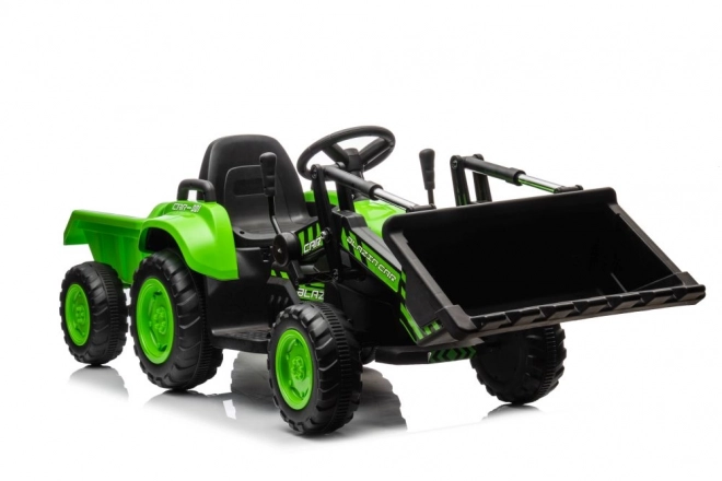 Elektrischer Kindertraktor mit funktionaler grüner Schaufel