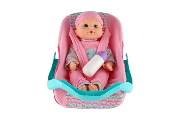 Niedliche Babypuppe 30cm mit Tragesitz und Fläschchen