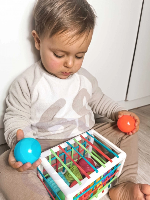 Bunte flexible WOOPIE Baby Sensorik-Würfel mit Formen-Sortierer