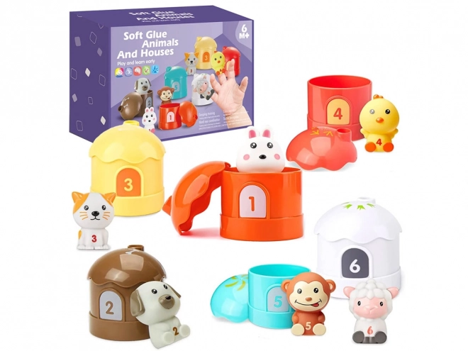 Set aus Tiergummis mit Häuschen und Zahlen
