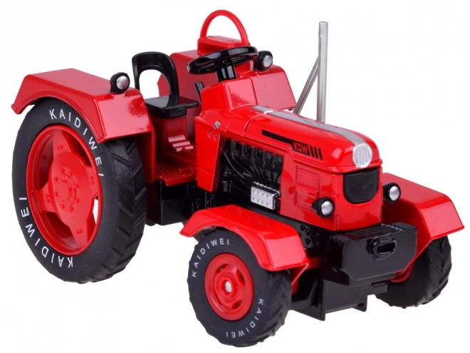 Roter Metalltraktor mit Anhänger 1:18