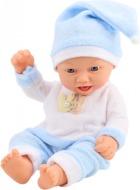 Puppe Baby in blauem Pyjama mit Mütze mit Bommel