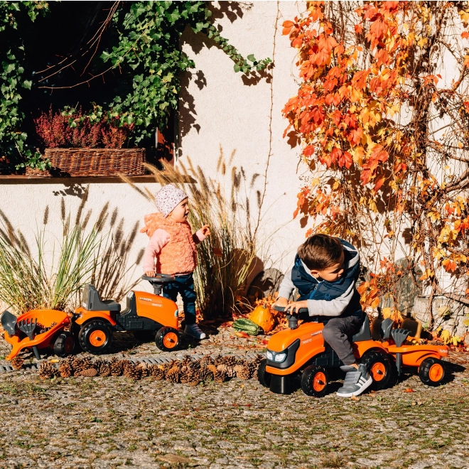 Baby-Kubota-Trettraktor mit Anhänger