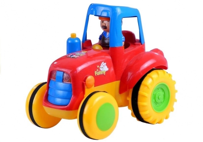 Bunter Kindertraktor mit Anhänger und Tieren