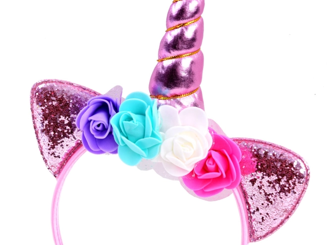 Glitzerndes Horn und florale Verzierung