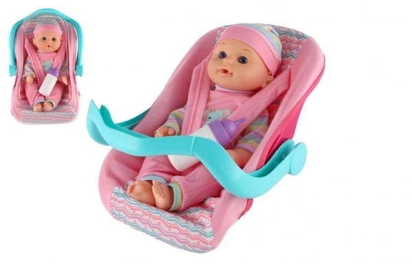 Niedliche Babypuppe 30cm mit Tragesitz und Fläschchen