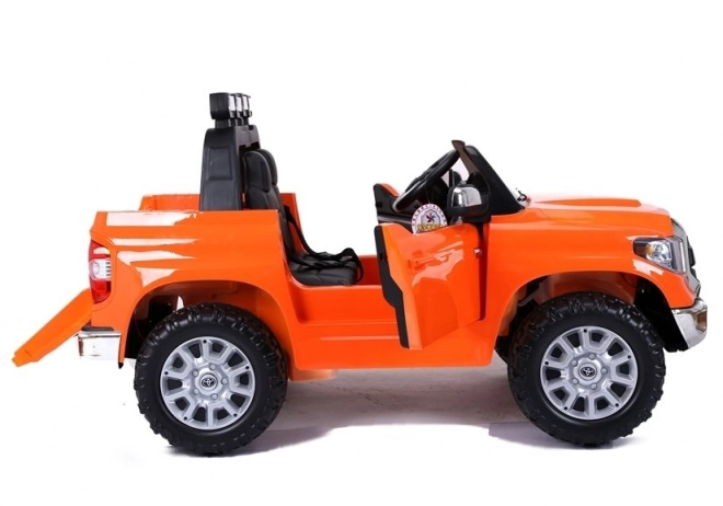 Spielzeugauto Elektrofahrzeug TOYOTA Tundra Orange