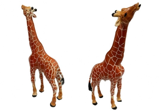 Bildungsfiguren Giraffenfamilie mit Afrika-Hintergrund