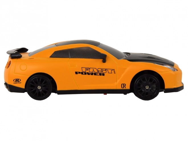 Ferngesteuerter Sportwagen R/C 1:24 mit austauschbaren Rädern – Gelb