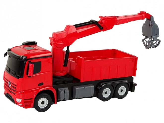Rote Mercedes Rastar Greifarm-LKW