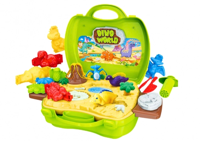 Kreatives Dino-Welt-Kit in einem Koffer mit grüner Knetmasse