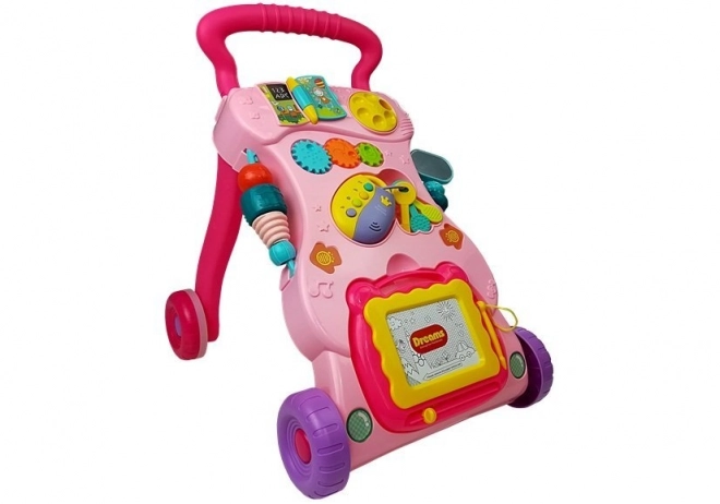 Pinker Baby Lauflernwagen mit Zaubertafel