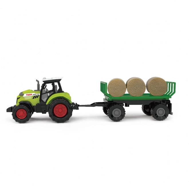 Traktor mit Sound und Licht mit Anhänger und Strohbündeln