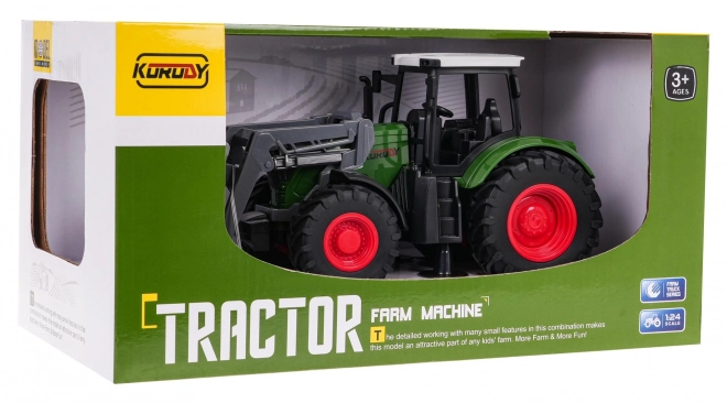 Grüner Traktor mit Schaufel