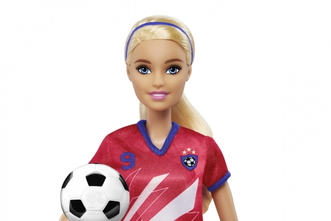 Barbie Fußballspielerin in rotem Trikot