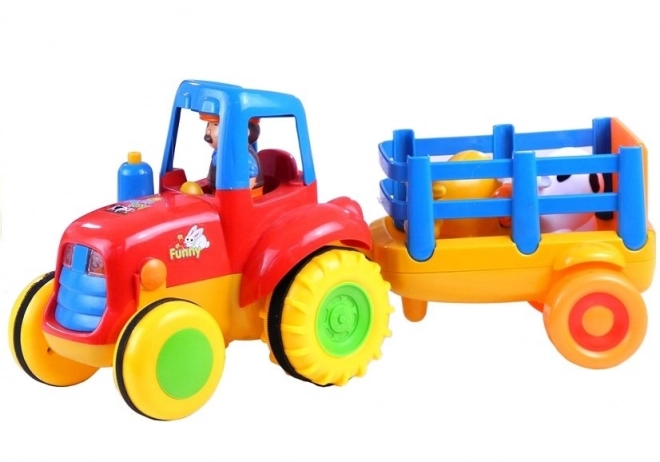 Bunter Kindertraktor mit Anhänger und Tieren