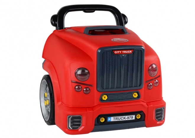 Roter Bastelset-LKW zum Auseinanderbauen