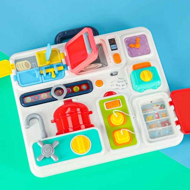 Montessori Manipulationsbrett mit Küchenelementen und lernender Uhr