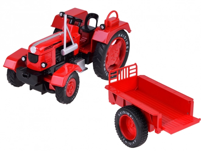 Roter Metalltraktor mit Anhänger 1:18