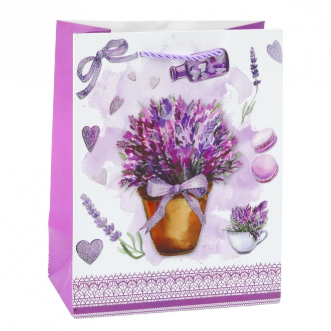 Papiergeschenktasche mit Lavendelmotiv und glitzernden Elementen