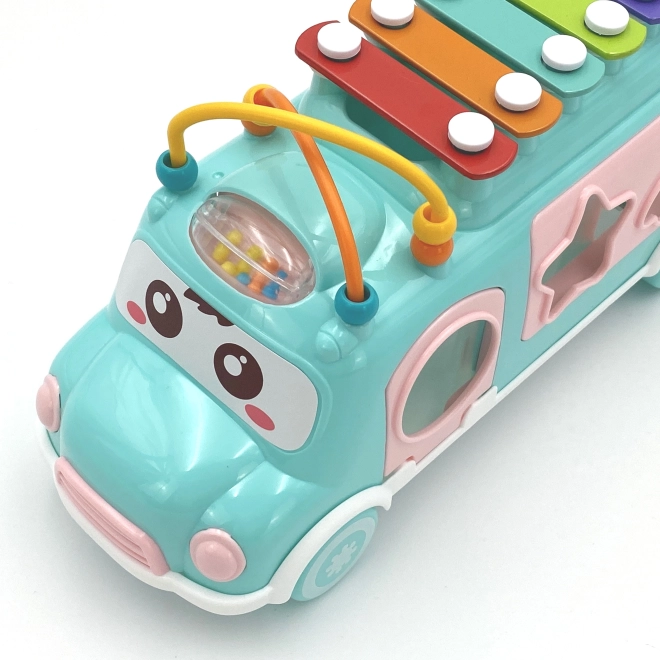 Woopie rosa Musikauto mit Sortierelementen und Zymbeln