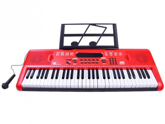 Rotes Kinder-Keyboard mit Mikrofon