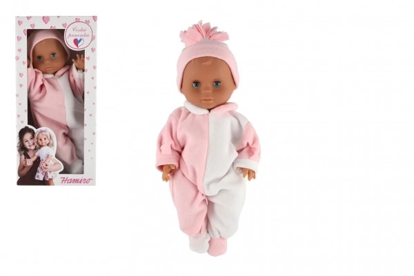 Süßes Hamiro-Baby mit festem Körper, weiß-rosa Overall und rosa Mütze