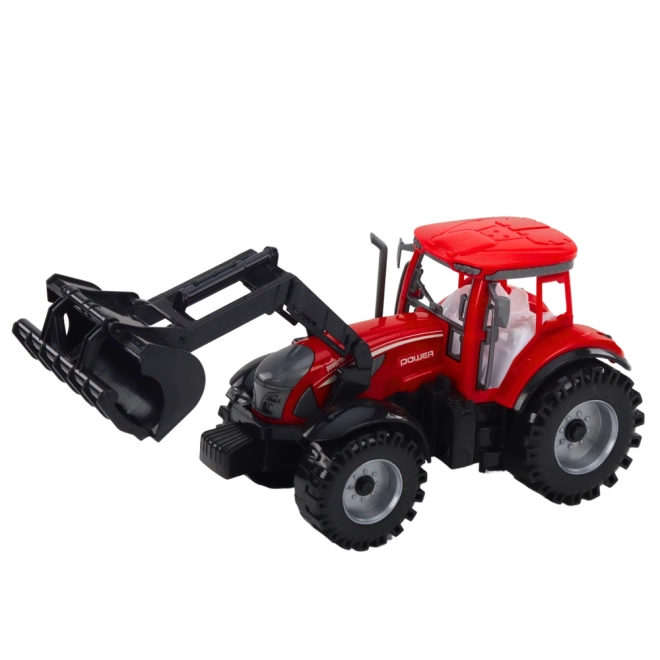 Roter Traktor mit Frontlader und Ballenpresse