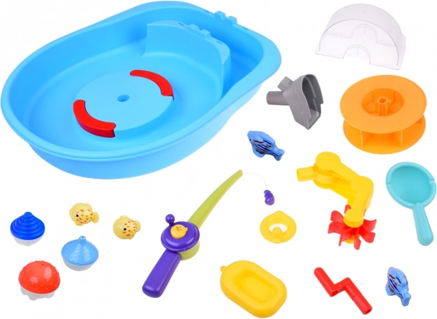 Blauer Wassertisch mit Mühlrad und Angelzubehör