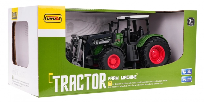 Grüner Traktor mit Greifer