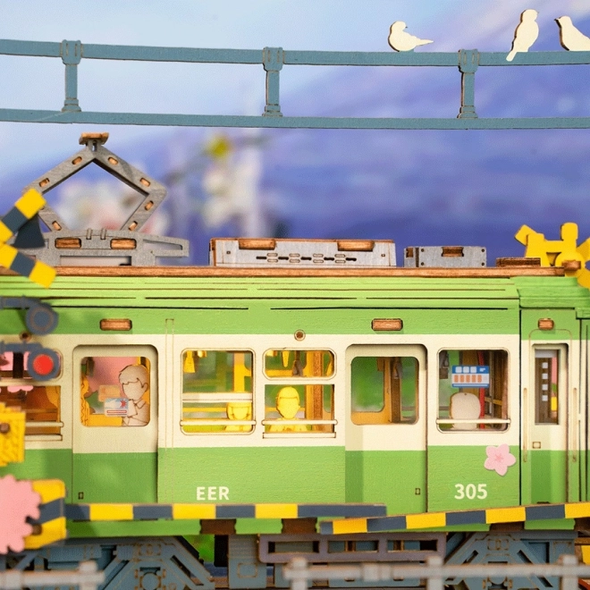 3D Holzpuzzle Japanische Straßenbahn mit Kirschblüten