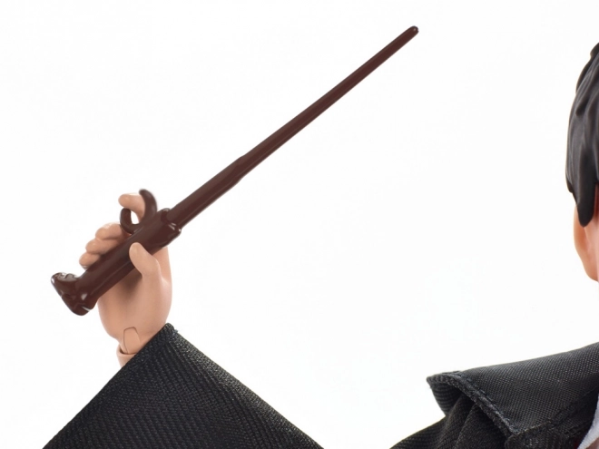 Harry Potter Puppe in Gryffindor Schuluniform mit Zauberstab