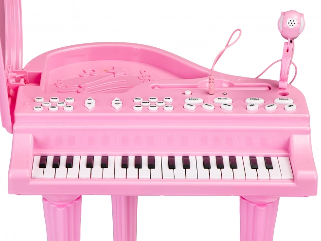 Kinder rosa Klavier mit Mikrofon und Hocker