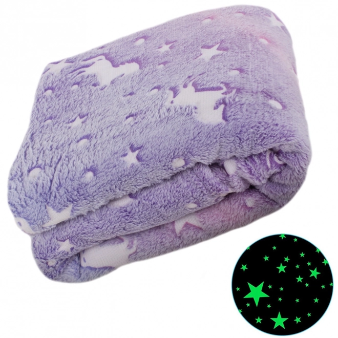 Fluoreszierende Kuscheldecke mit Einhorn-Motiv