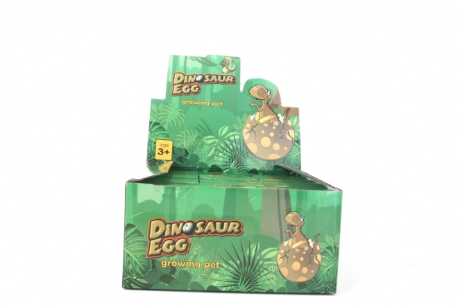 Überraschungs-Ei mit wachsendem Dinosaurier