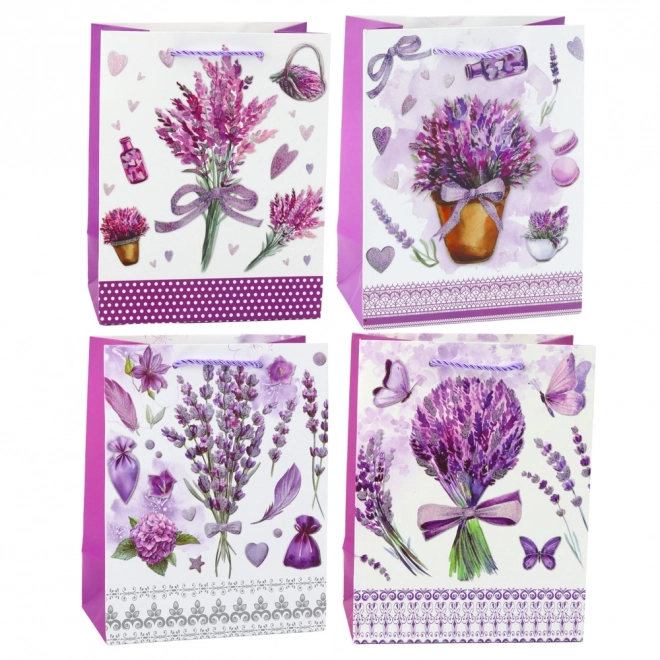 Papiergeschenktasche mit Lavendelmotiv und glitzernden Elementen