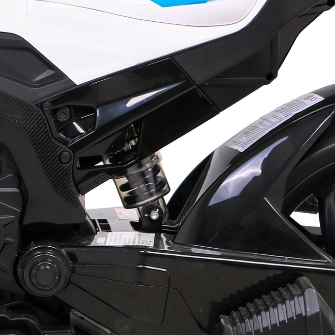 Kinder-Elektromotorrad BMW HP4 Blau + Stützräder + sanfter Start + EVA + MP3 LED