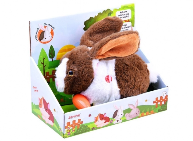 Interaktives Springender Hase mit Karotte – braun