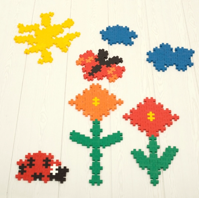 Konstruktionsspielzeug Plus-Plus Mini Mix 600 Teile mit Platten