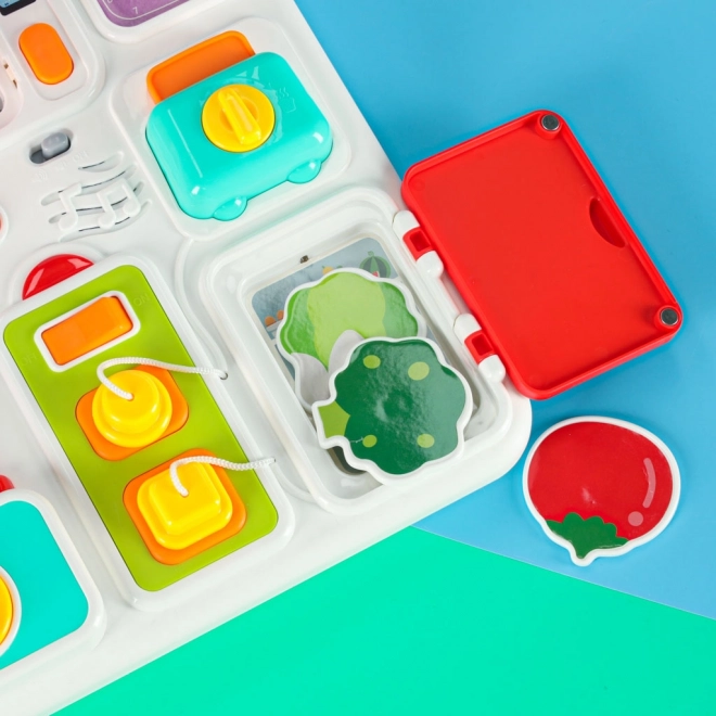 Montessori Manipulationsbrett mit Küchenelementen und lernender Uhr