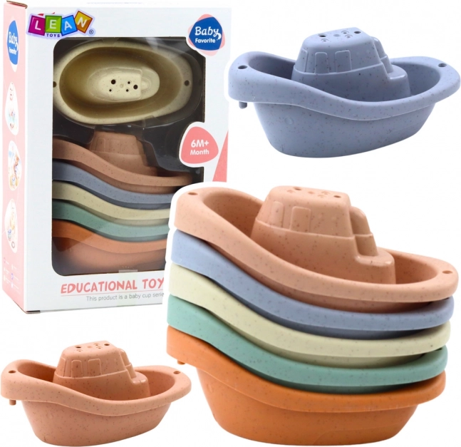 Set aus pastellfarbenen Badebooten für Kinder