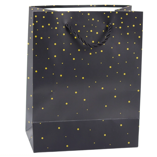 Geschenktüte mit goldenen Punkten