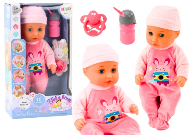 Puppe Baby in rosa Schlafanzug mit Geräuschen